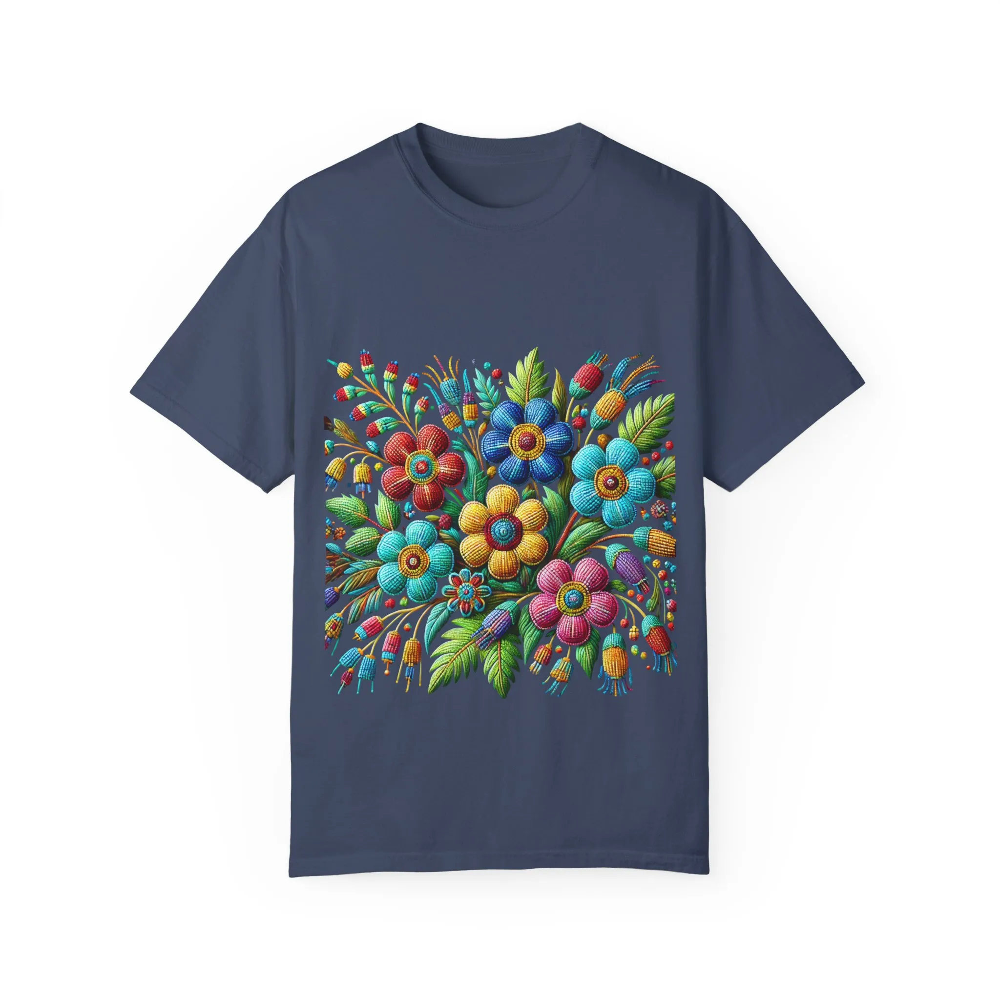 Colorful floral t-shirt with artistic flower print, vibrant unisex garment-dyed tee, bohemian botanical design t-shirt, handmade style floral print tee on light blue fabric.