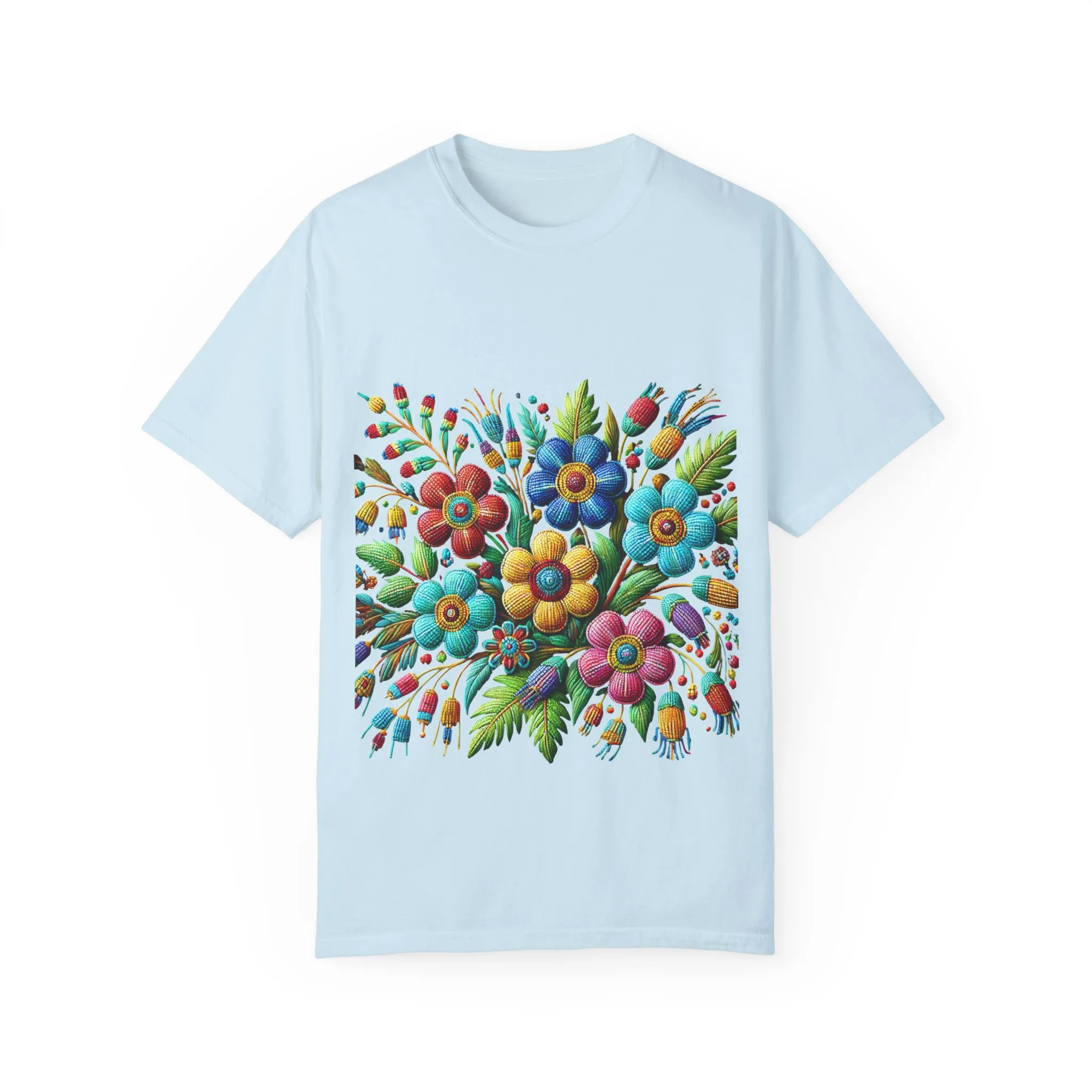 Colorful floral t-shirt with artistic flower print, vibrant unisex garment-dyed tee, bohemian botanical design t-shirt, handmade style floral print tee on light blue fabric.