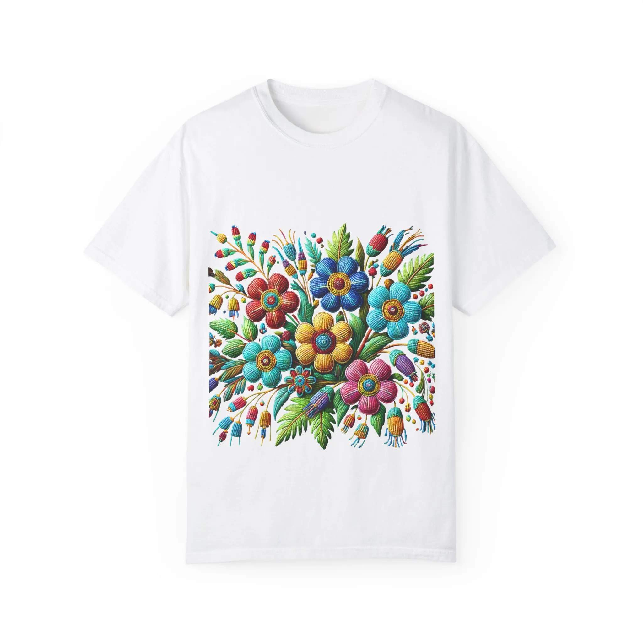 Colorful floral t-shirt with artistic flower print, vibrant unisex garment-dyed tee, bohemian botanical design t-shirt, handmade style floral print tee on light blue fabric.